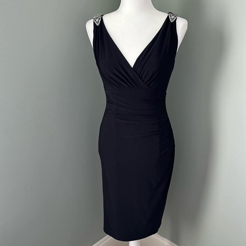 Ralph Lauren Evening Black mini dress with embellishment at shoulder. EUC